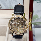 gold mechanical wrist watch with brown band