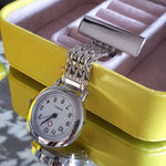 silver metal nurse watch